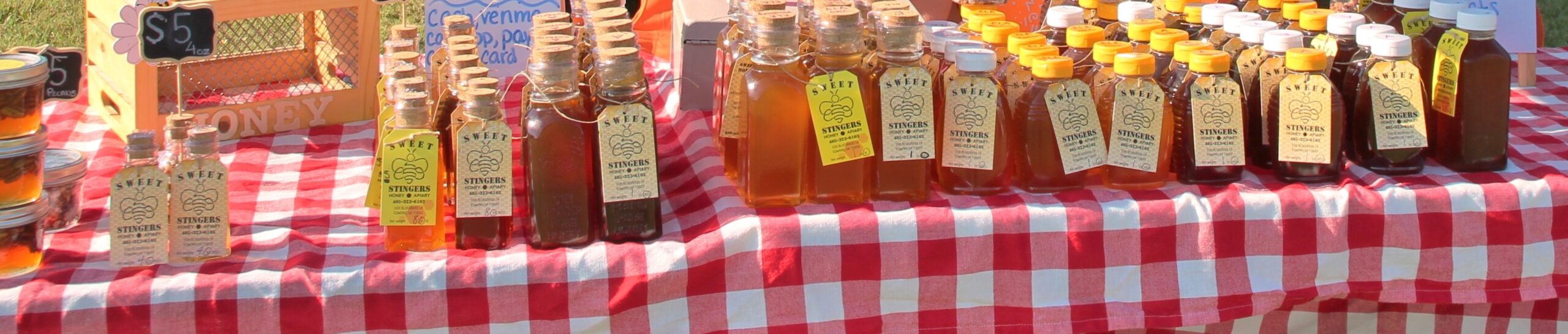 Sweet Stingers products are ready at an outdoor Oklahoma event. Photo by Carol Mowdy Bond.