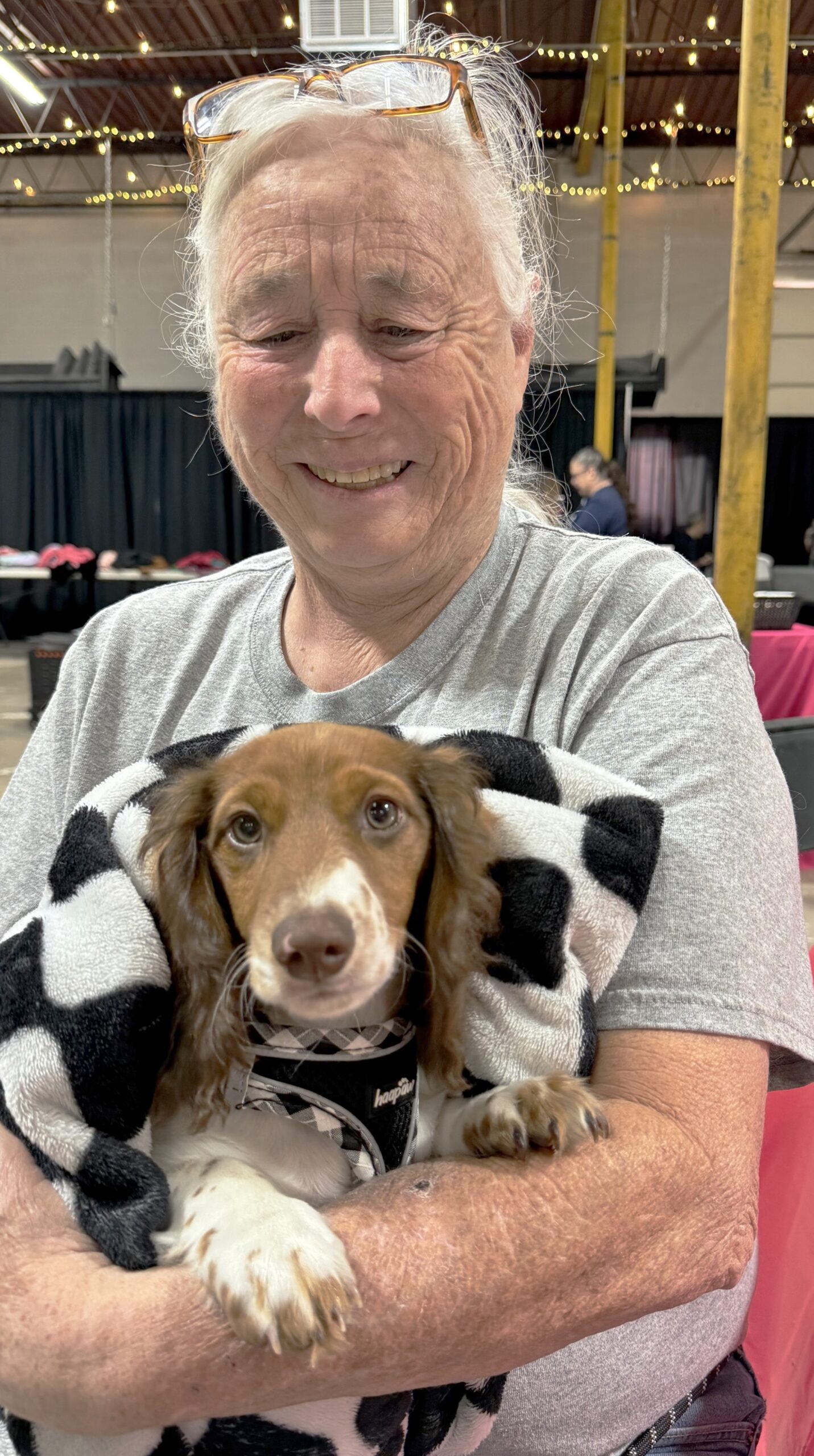 Sarah holds King at CCPRF’s pet vaccine clinic held at Love Sick Ministries in Lawton in April 2026. Photo by M. Cronk.
