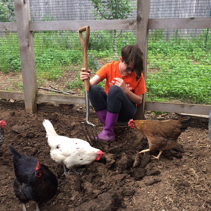 A young Lily Gehres helps tend the family’s flock.