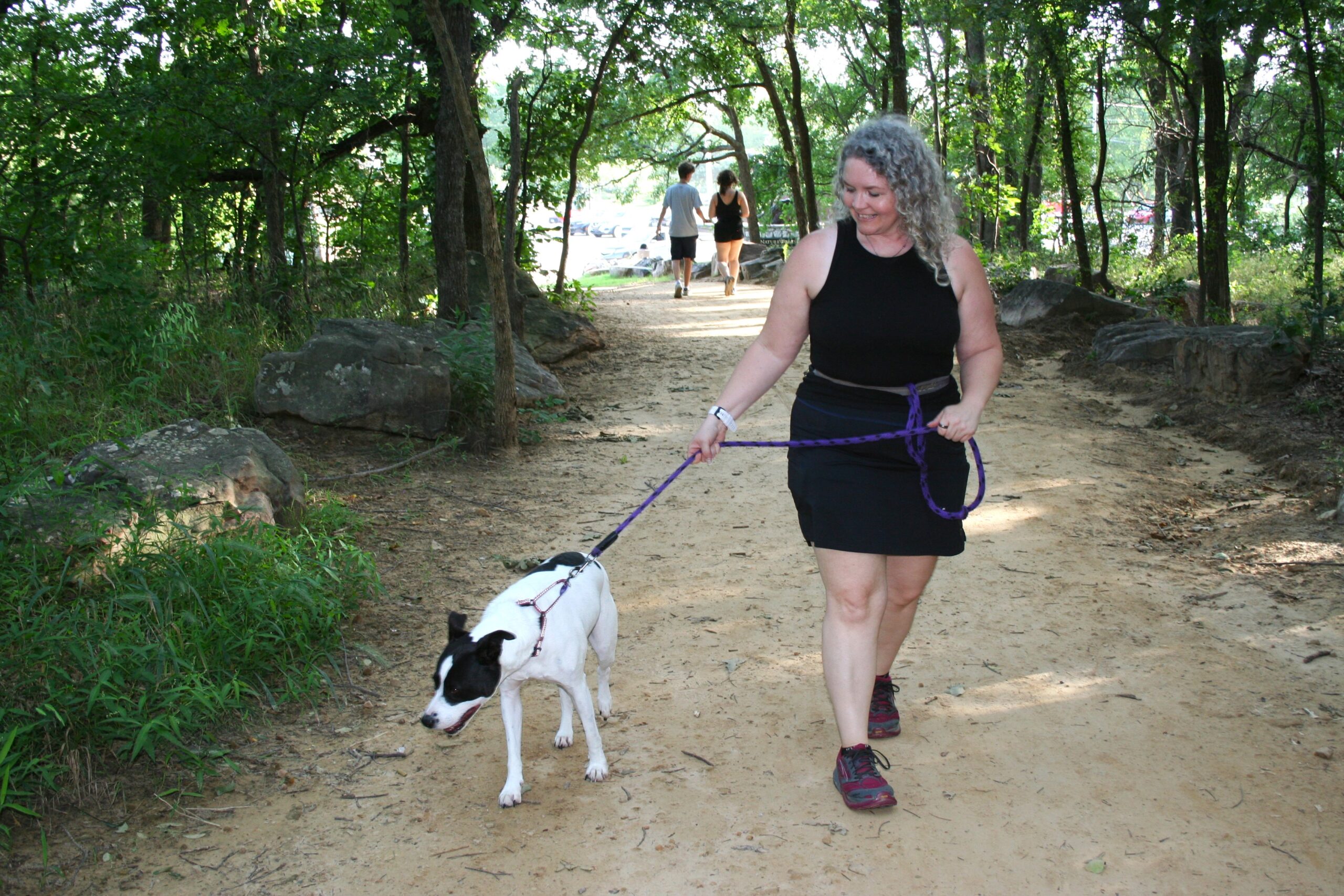 Hit the Trail Anastasia Kilpatrick of Tulsa takes her dog, Debbie, 6, for a hike at Tulsa’s Turkey Mountain Urban Wilderness Area. Photo by Sharon Bishop-Baldwin.